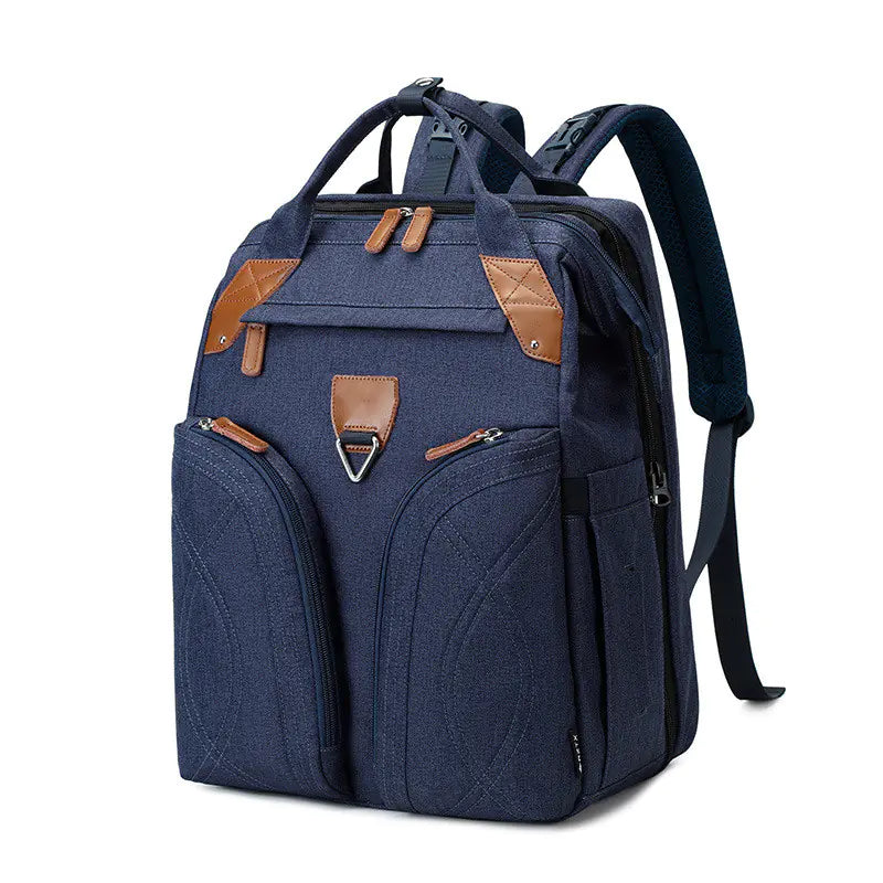 Navy blue backpack with brown accents on a white background